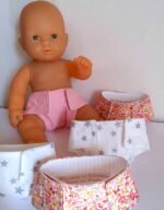 Couche poupée rose et blanche