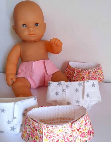 Couche poupée rose et blanche